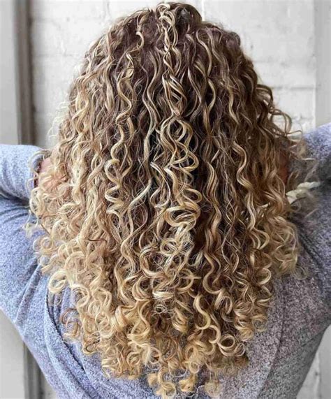 balayage blonde curly hair|long blonde hair getting balayage.